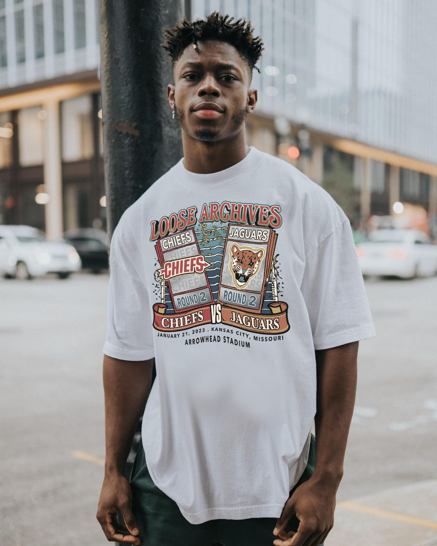 ROUND TWO TICKETS TEE IN WHITE